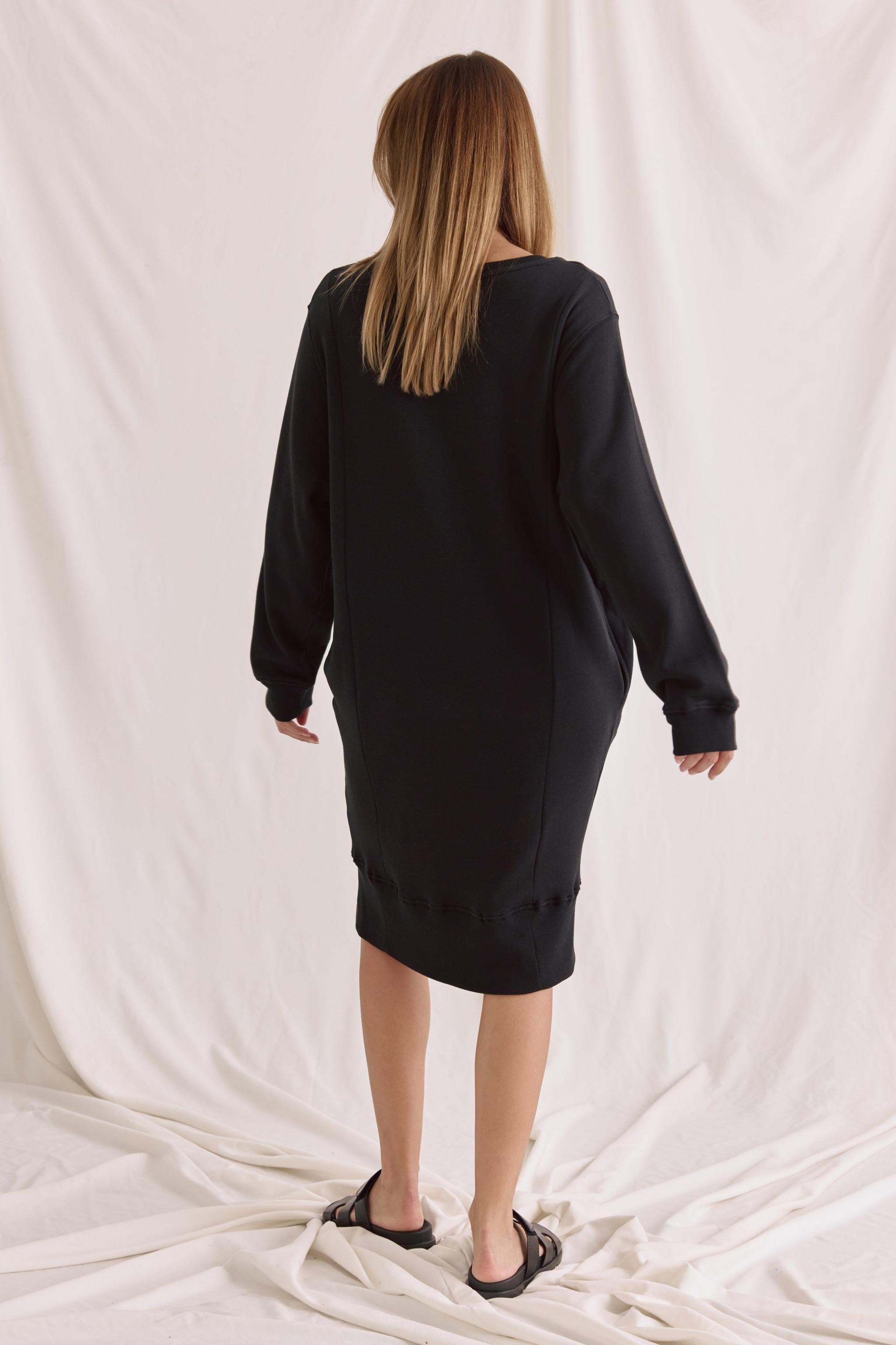 Soft sweat dress with round neck and hem offset