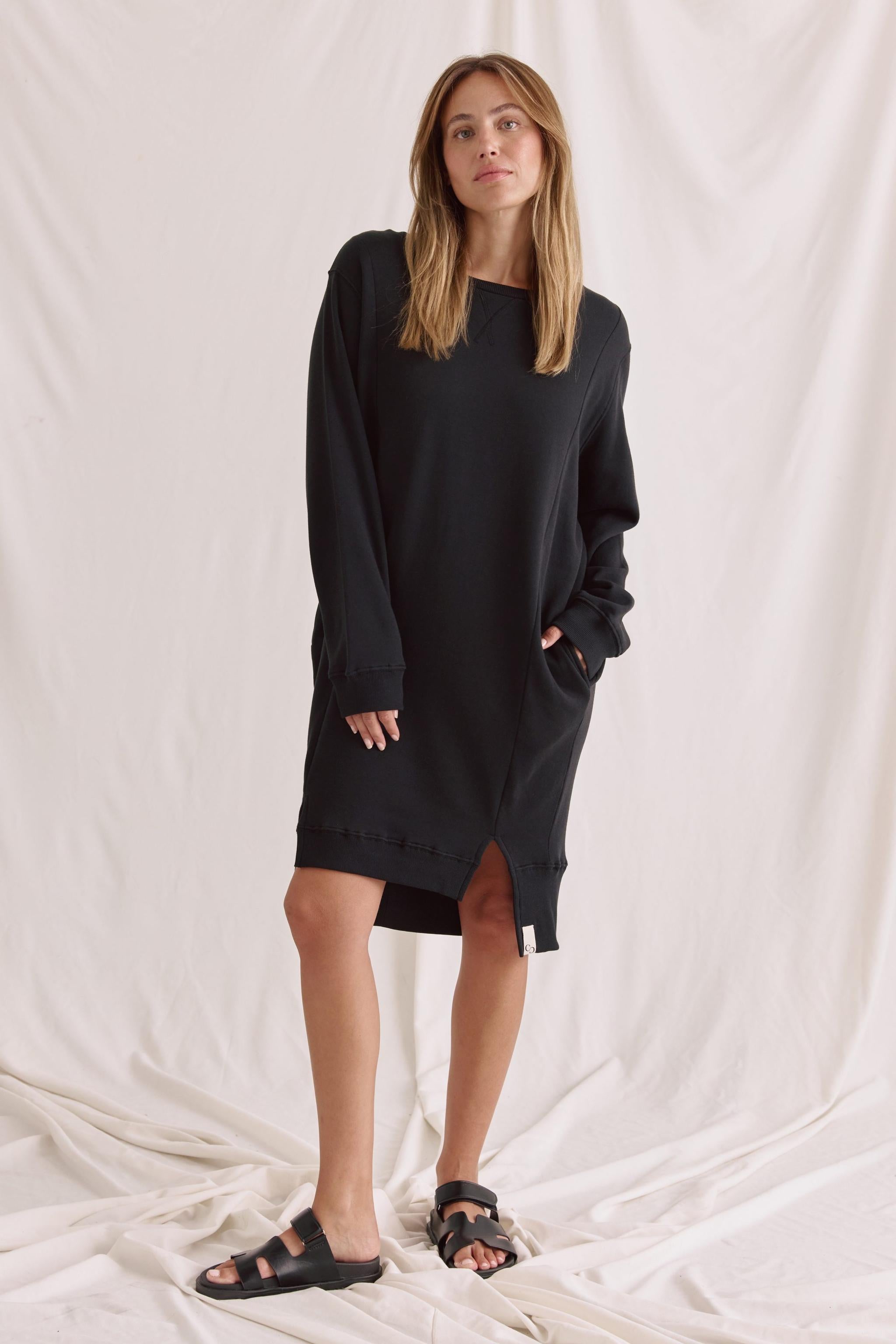 Soft sweat dress with round neck and hem offset