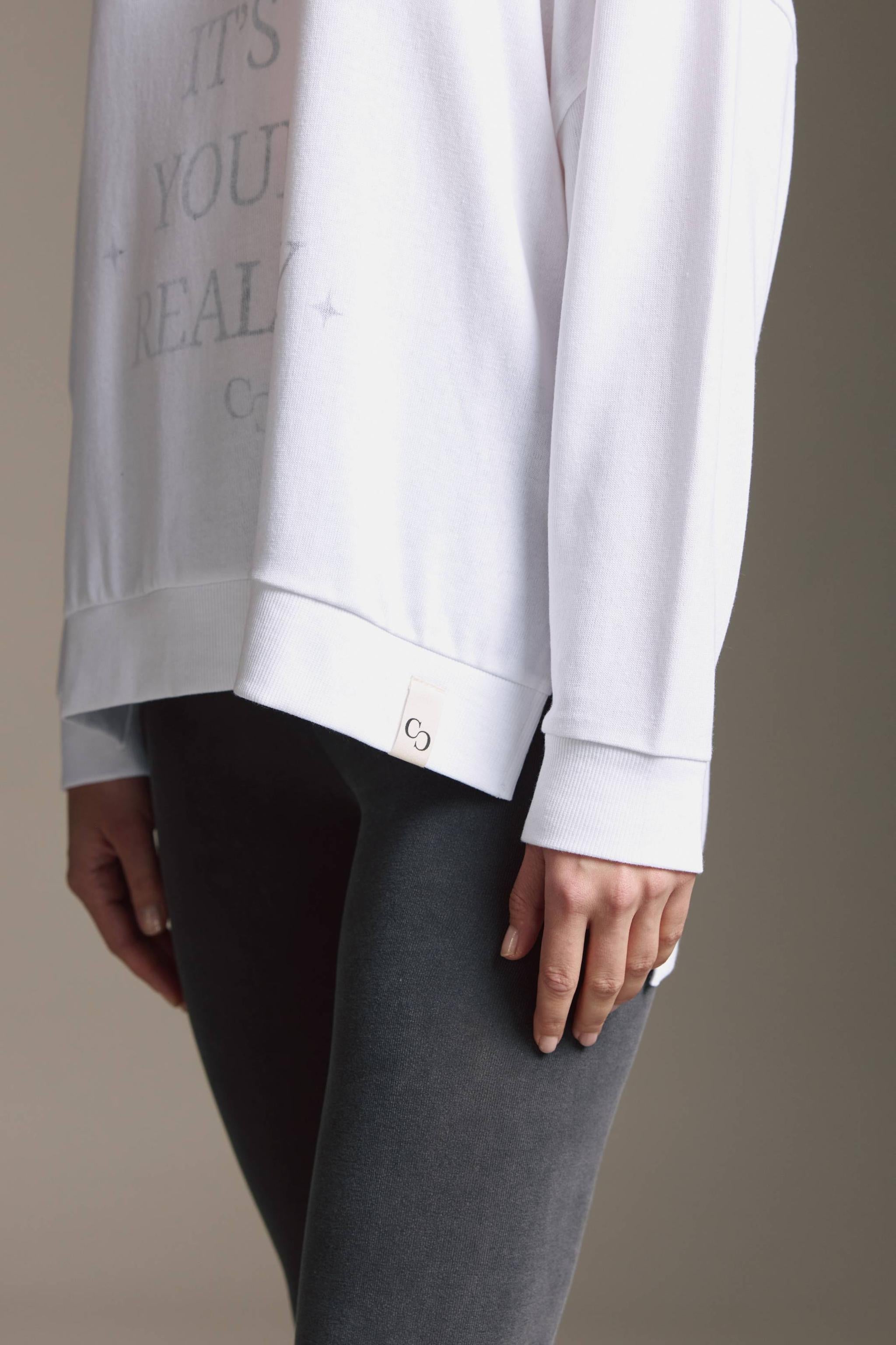Strickoptik Langarmshirt Mit Rundhals, Seitenschlitzen Und Dream Until ItS Your Reality Druck