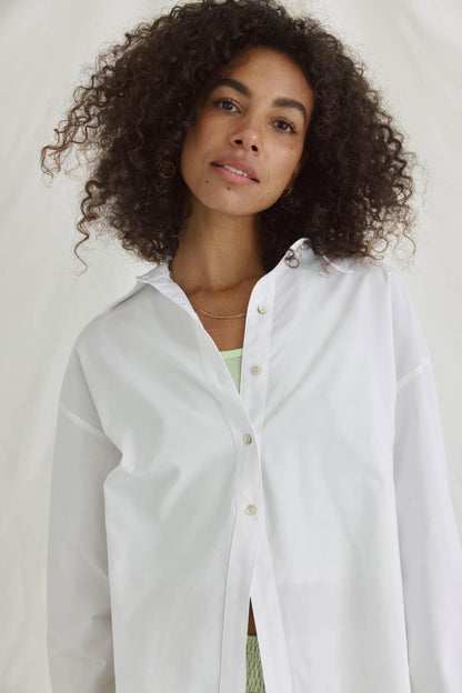 Bluse Mit Verkürztem Rücken Und Volants