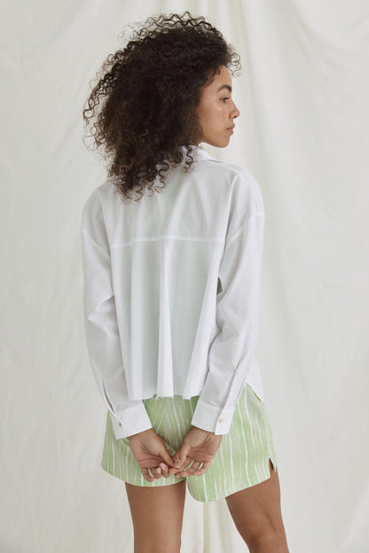 Bluse Mit Verkürztem Rücken Und Volants