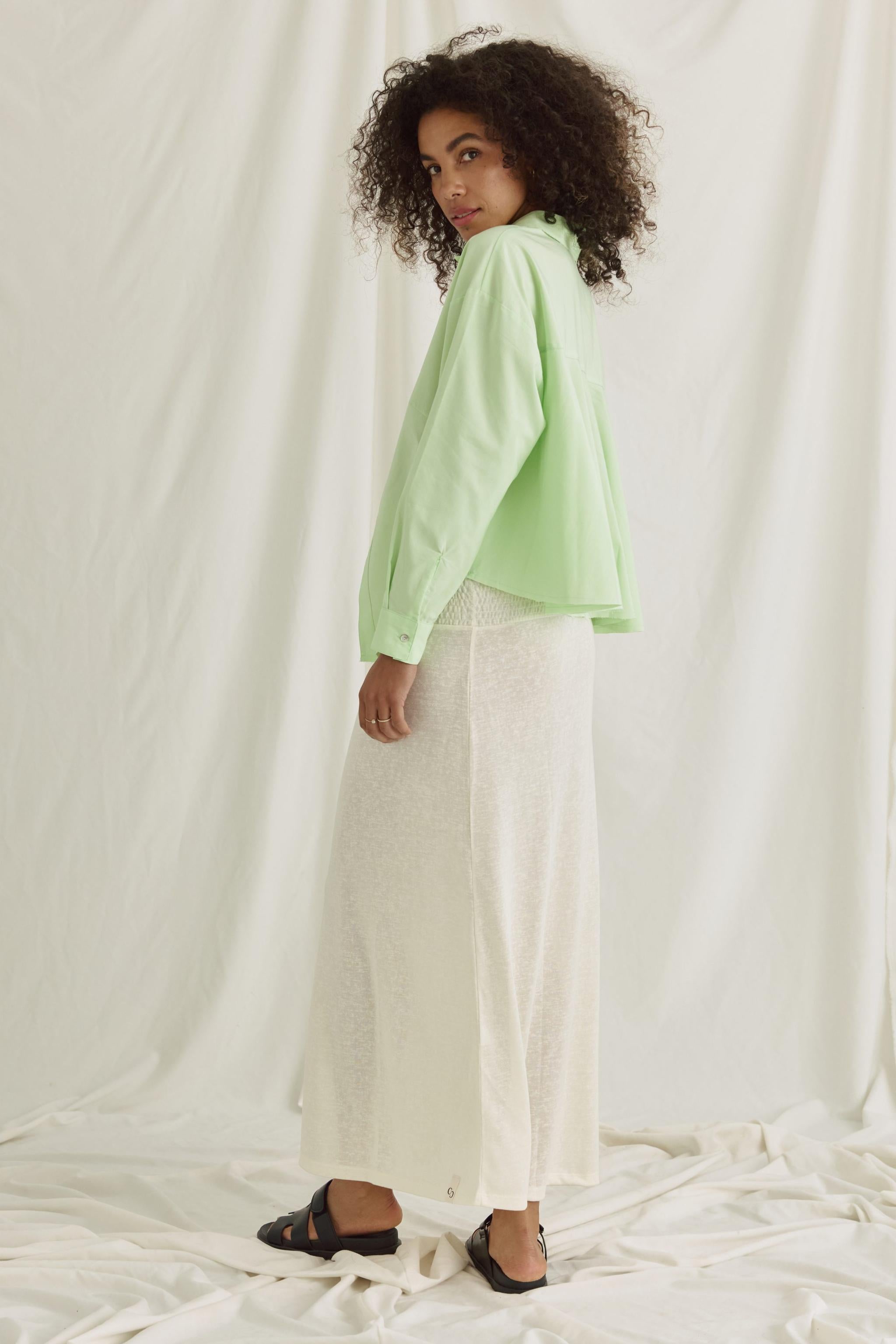 Bluse Mit Verkürztem Rücken Und Volants