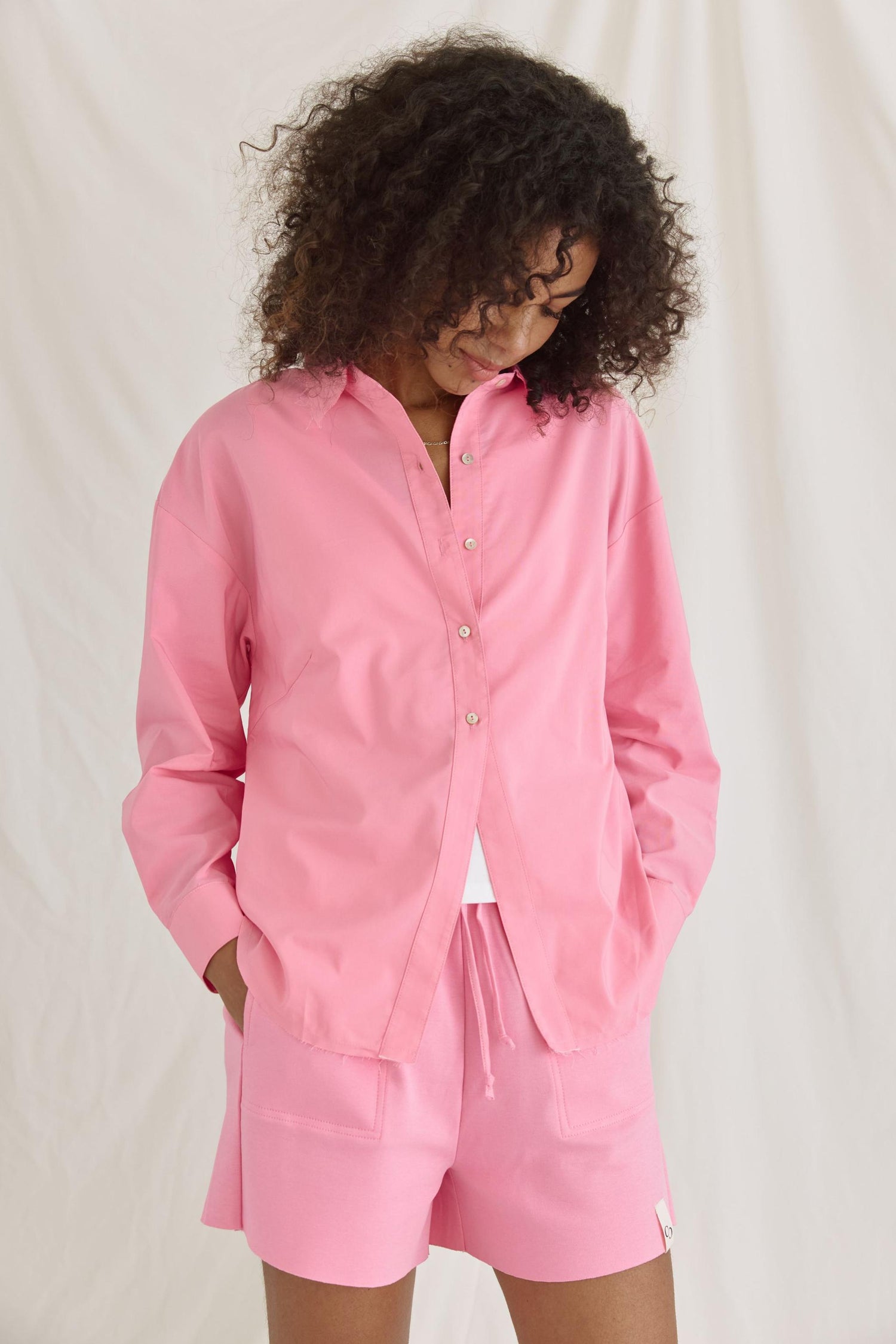 Bluse Mit Verkürztem Rücken Und Volants