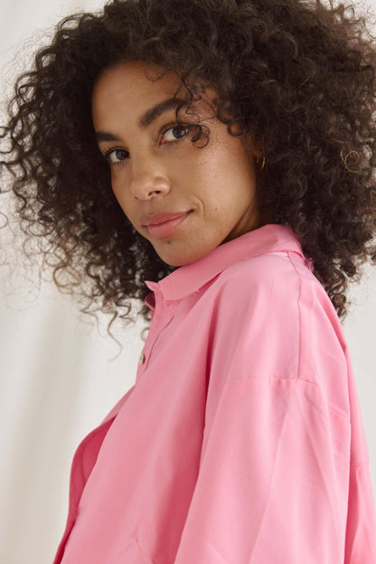 Bluse Mit Verkürztem Rücken Und Volants
